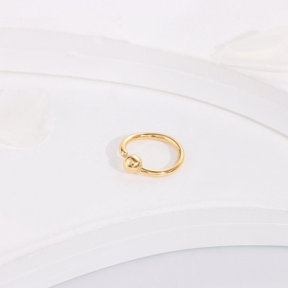a beautiful gold earrings