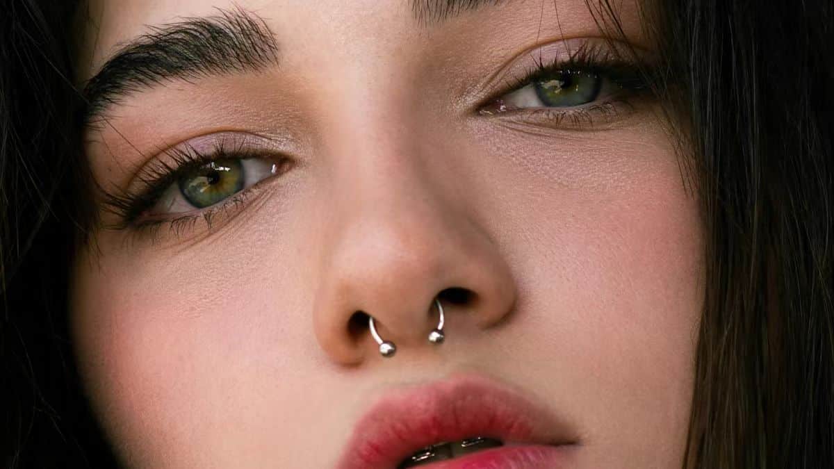 the appearance of wearing nose ring.