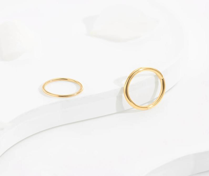 Geometric shapes are currently a popular design trend for gold earrings.