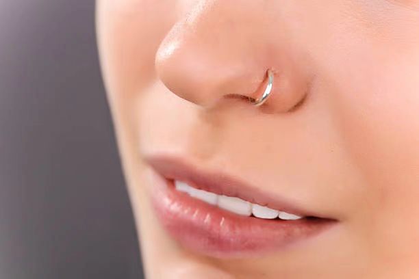 Inserting a nose ring for the first time can be daunting but following the right steps can make it easier. 