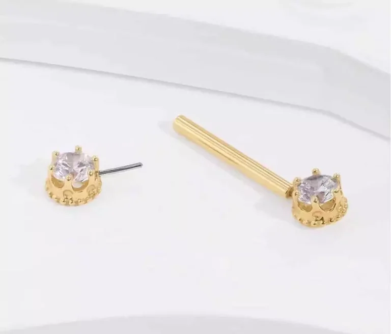 gold nipple piercing