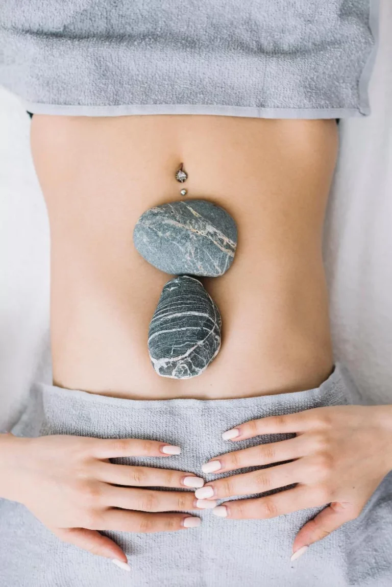 1-a woman with belly button piercing