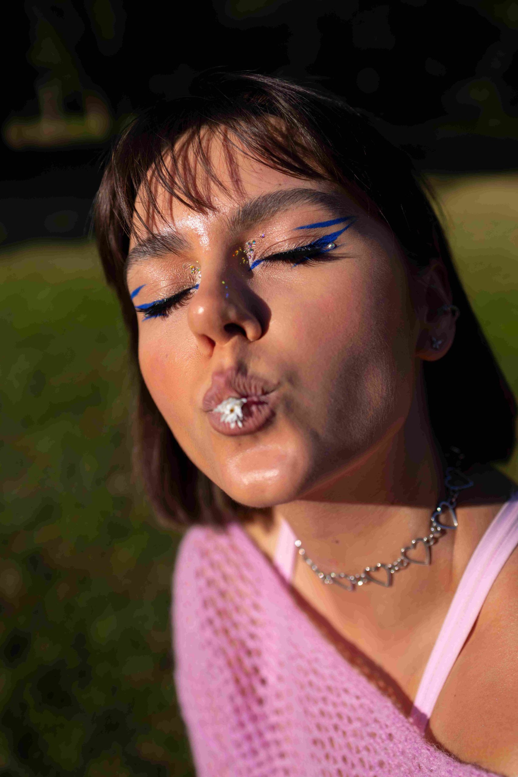 high-angle-woman-with-graphic-eye-makeup