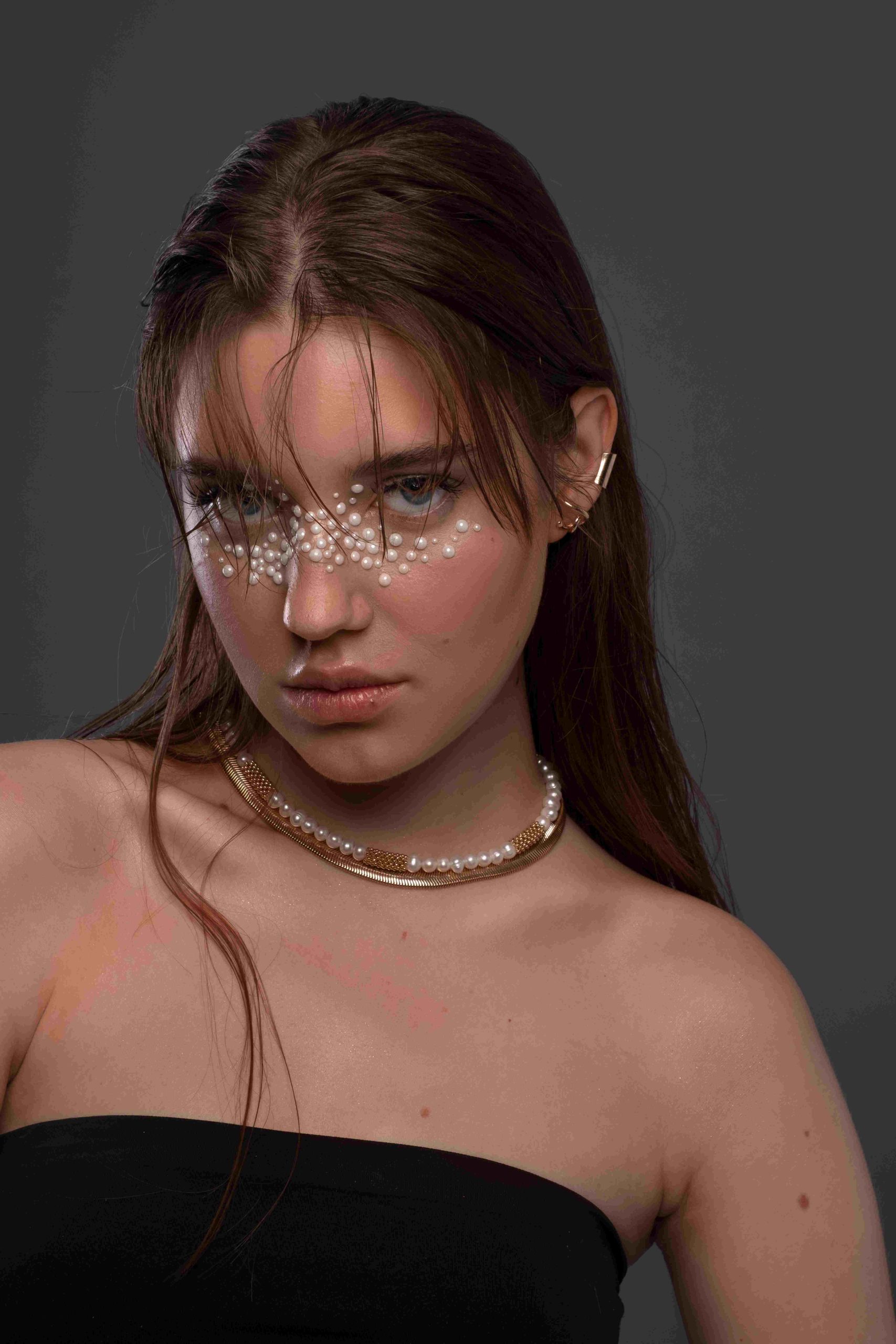 portrait-woman-wearing-jewelry-makeup