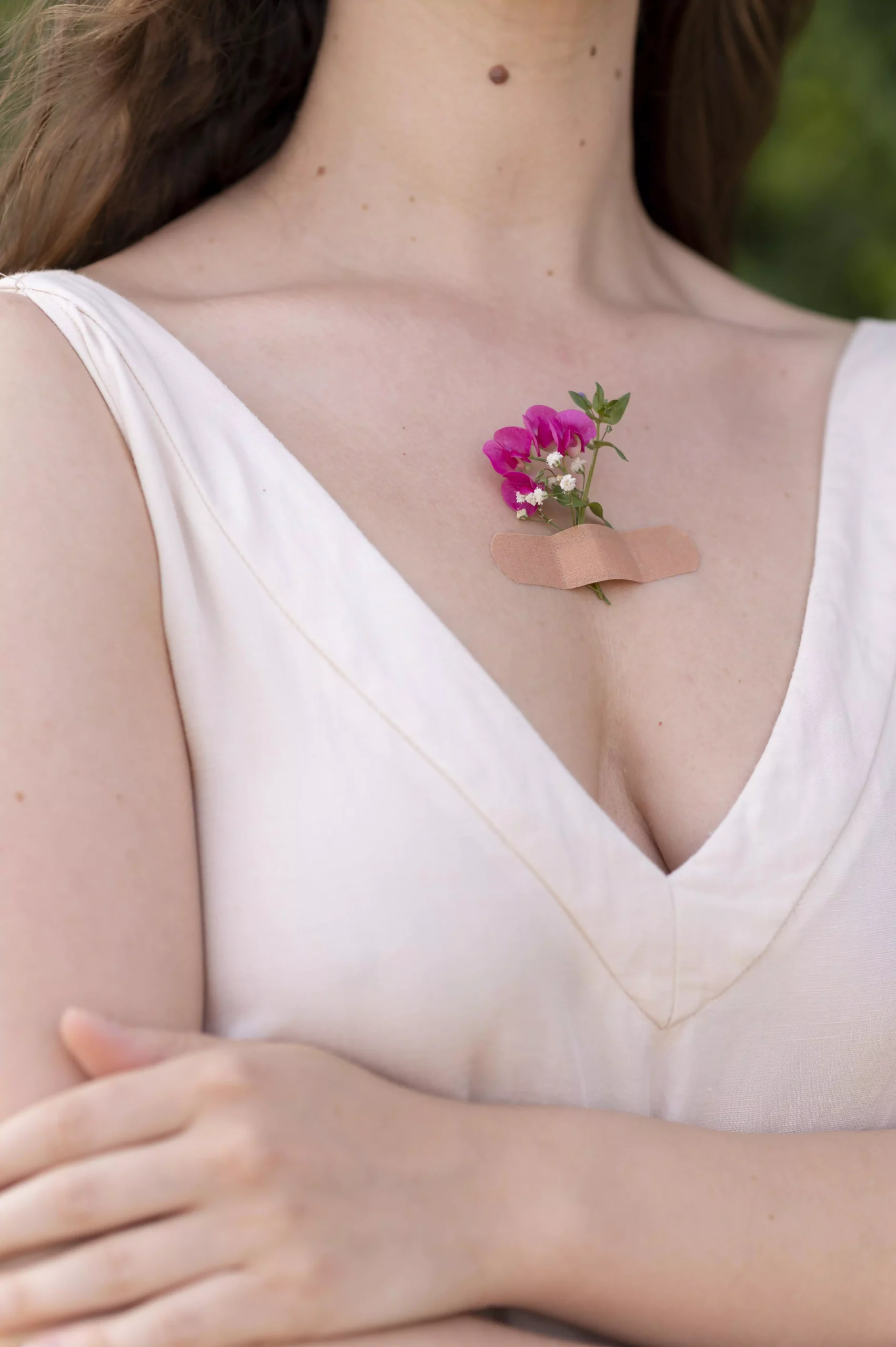 portrait-young-woman-posing-confidently-outdoors-with-flowers