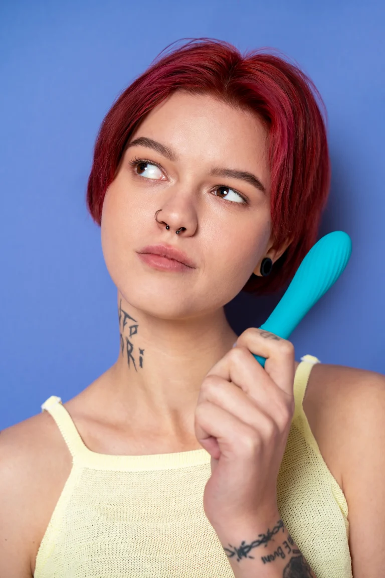 woman-holding-blue-vibrator