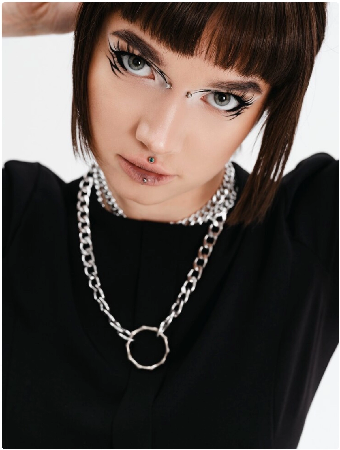 A-fashionable-woman-with-lip-studs-and-eyebrow-studs