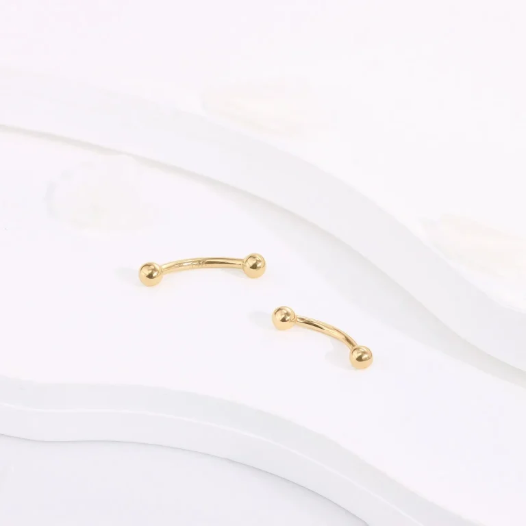 1- 14k solid gold curved barbell eyebrow ring